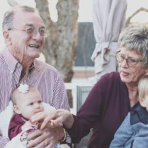 Elderly Couple Playing with Grandkids